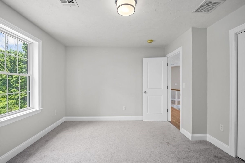 60 Sandersdale Road Charlton, MA 01507 - Photo 30 of 35 a view of a room that has a window in it