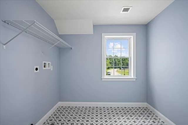 a view of a room that has a window in it