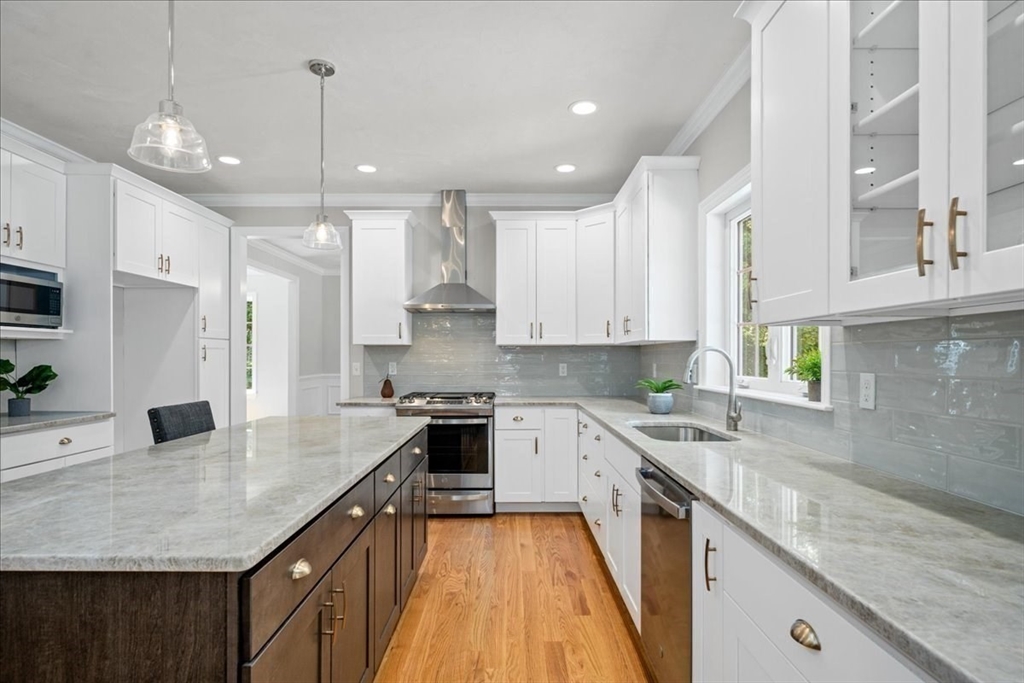60 Sandersdale Road Charlton, MA 01507 - Photo 8 of 35 a kitchen with stainless steel appliances granite countertop a sink stove and refrigerator