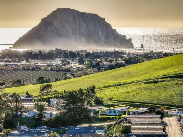a view of a swimming pool with an ocean view