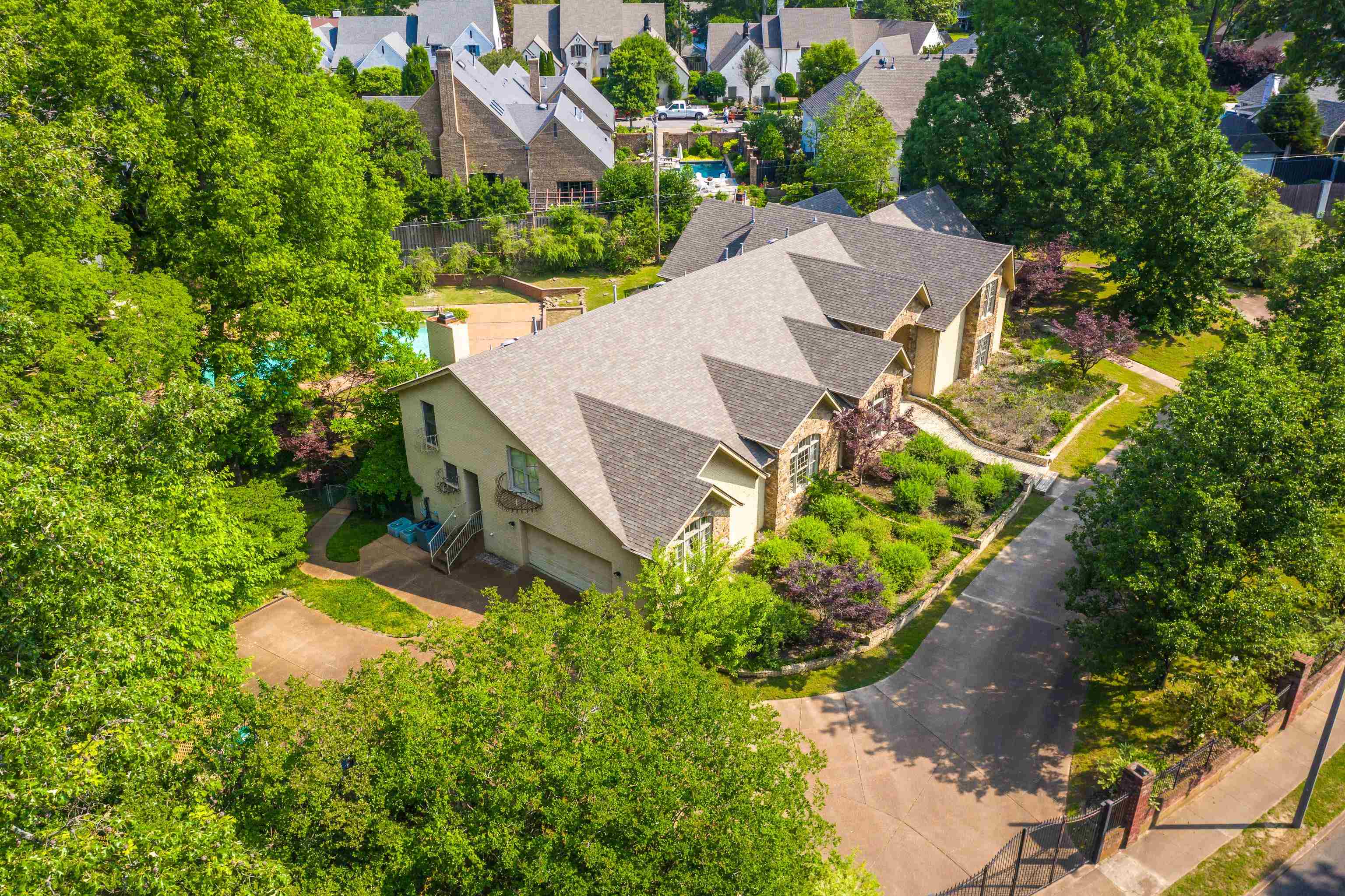 5270 Walnut Grove Road Memphis, TN 38120 - Photo 3 of 25 an aerial view of a house with yard swimming pool and outdoor seating