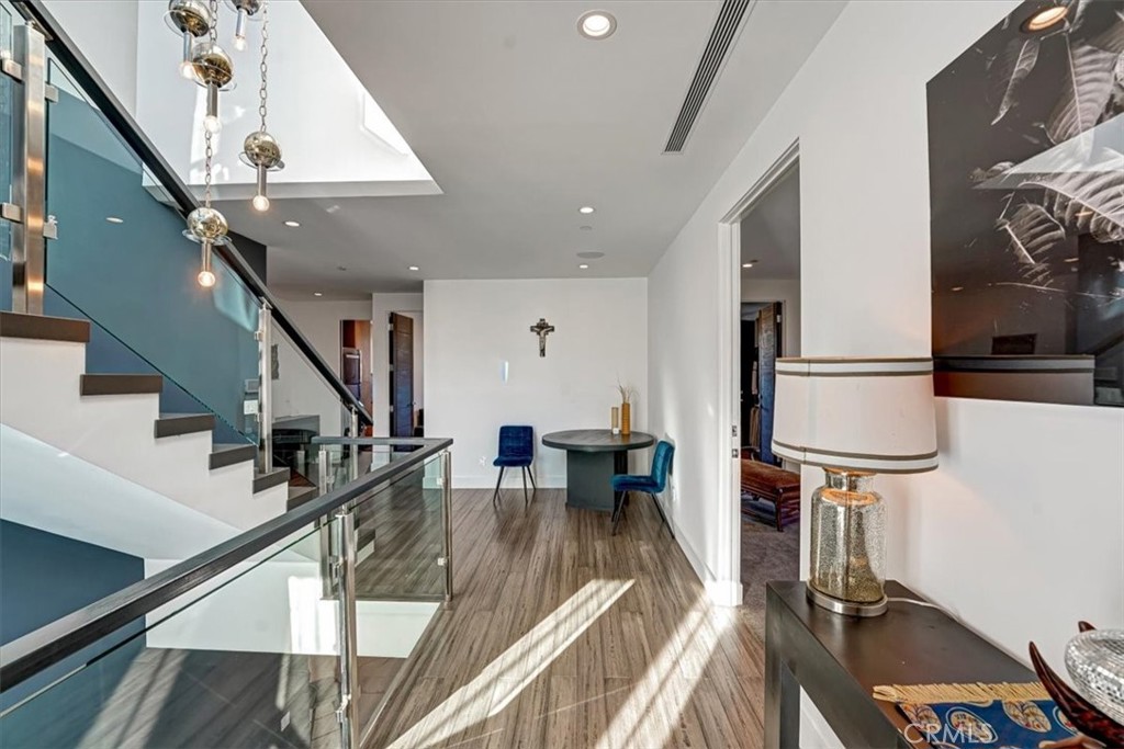 2012 South Curson Avenue Los Angeles, CA 90016 - Photo 12 of 40 a view of a living room with furniture and floor to ceiling windows