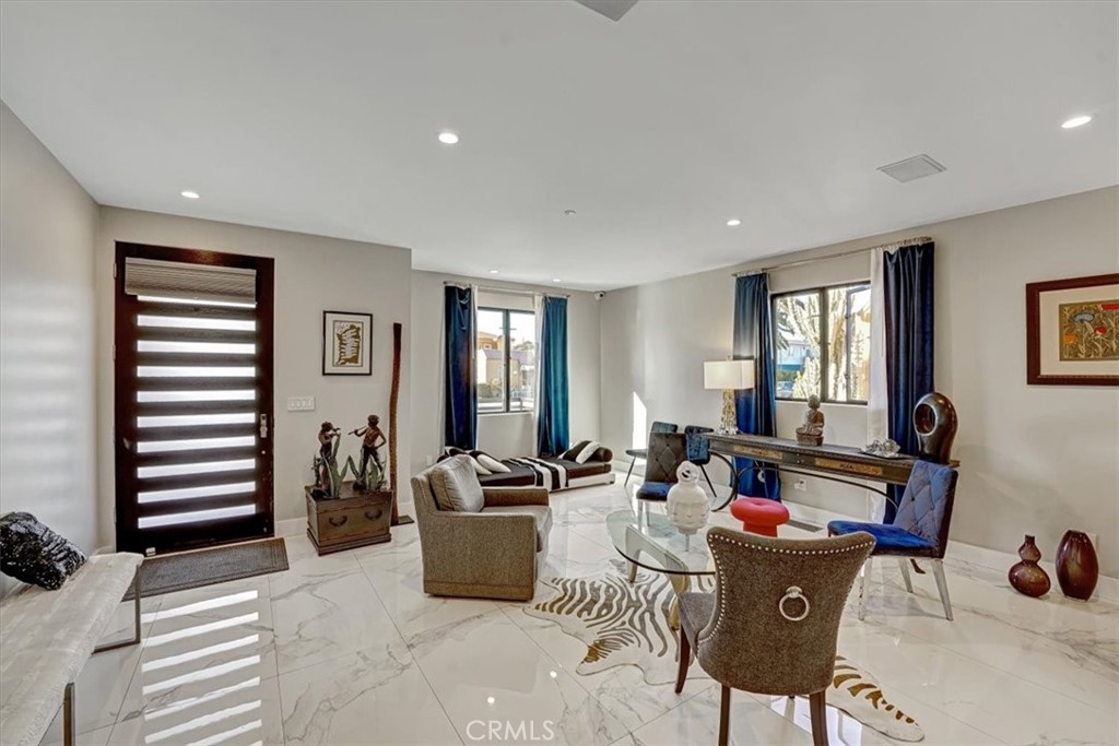 2012 South Curson Avenue Los Angeles, CA 90016 - Photo 4 of 40 a living room with furniture and a window