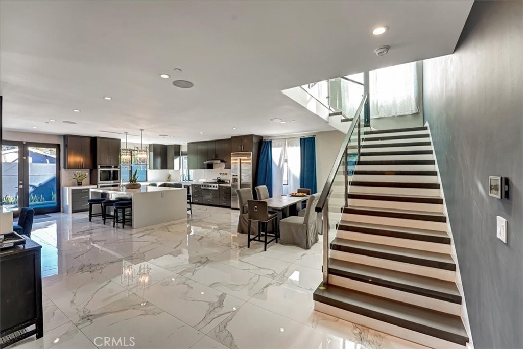 2012 South Curson Avenue Los Angeles, CA 90016 - Photo 7 of 40 a living room with furniture and a kitchen