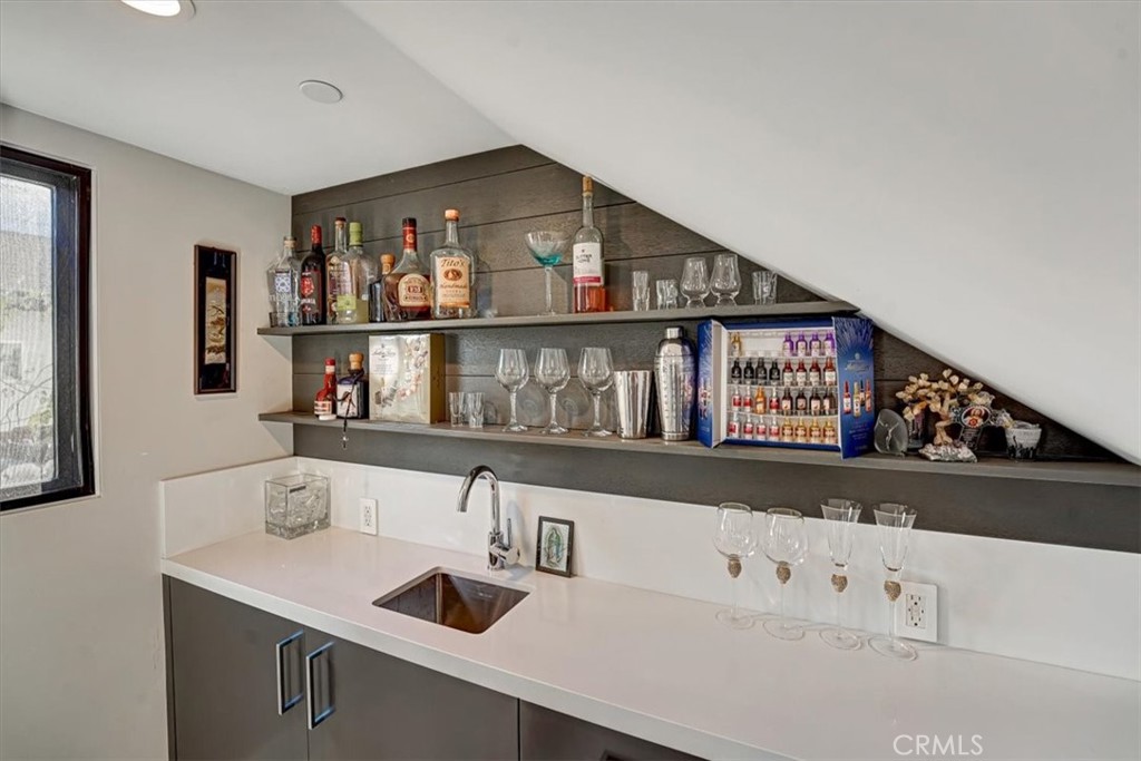 2012 South Curson Avenue Los Angeles, CA 90016 - Photo 8 of 40 a kitchen with stainless steel appliances a sink and a refrigerator
