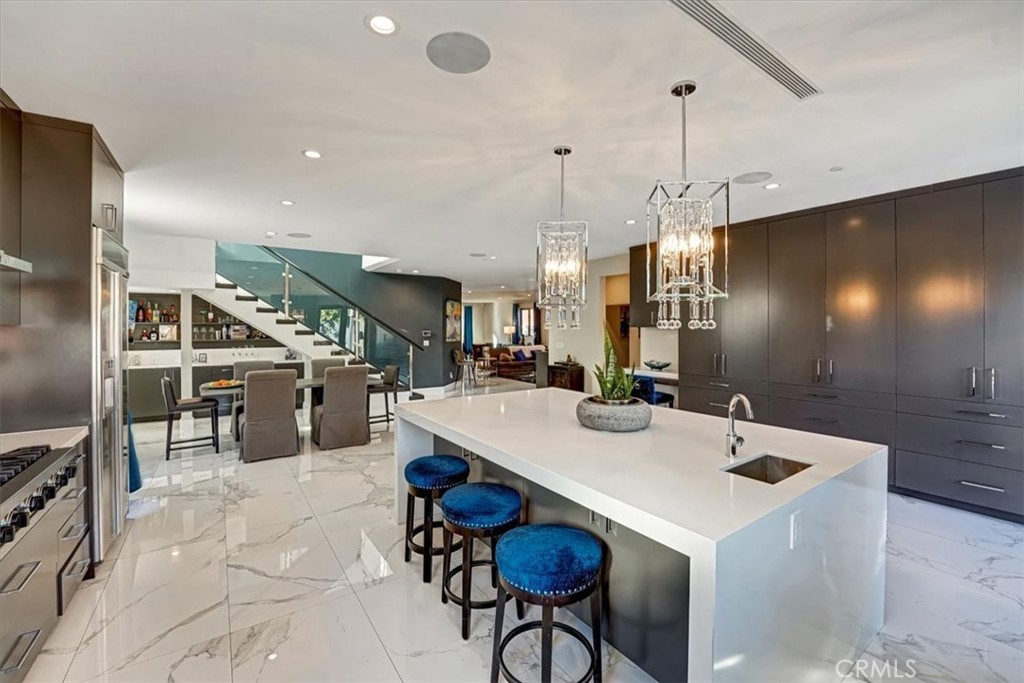 2012 South Curson Avenue Los Angeles, CA 90016 - Photo 10 of 40 a large kitchen with a table and chairs