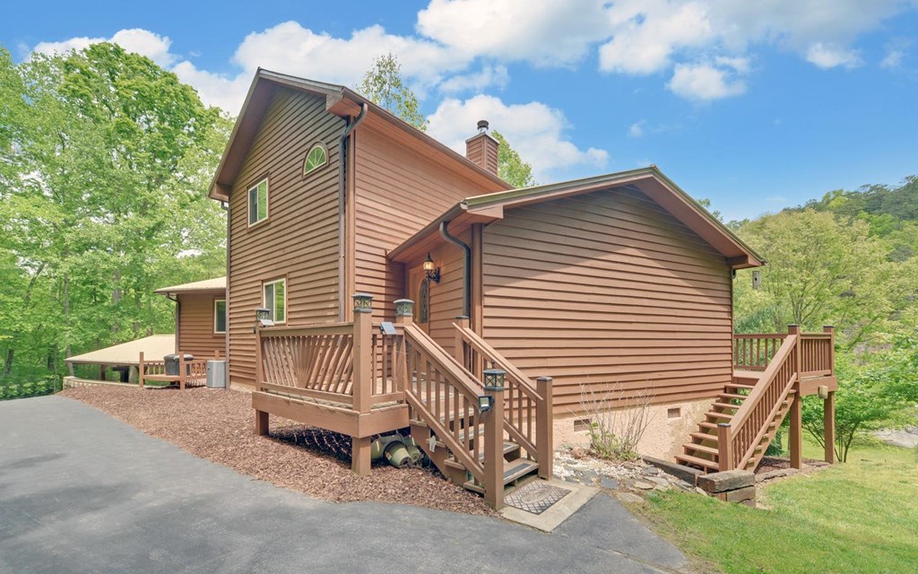 1720 Caney Creek Road Murphy, NC 28906 - Photo 2 of 69 a view of a house with a yard
