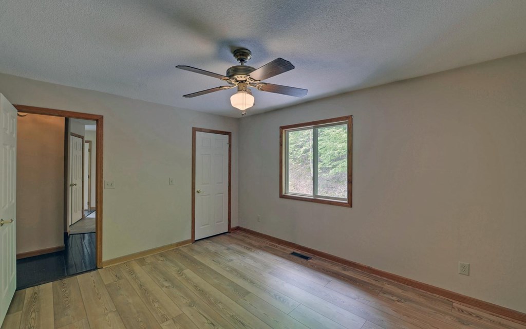1720 Caney Creek Road Murphy, NC 28906 - Photo 27 of 69 a view of an empty room with a window