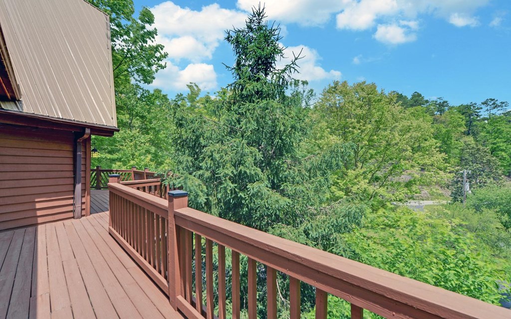 1720 Caney Creek Road Murphy, NC 28906 - Photo 40 of 69 a view of balcony with wooden floor and fence