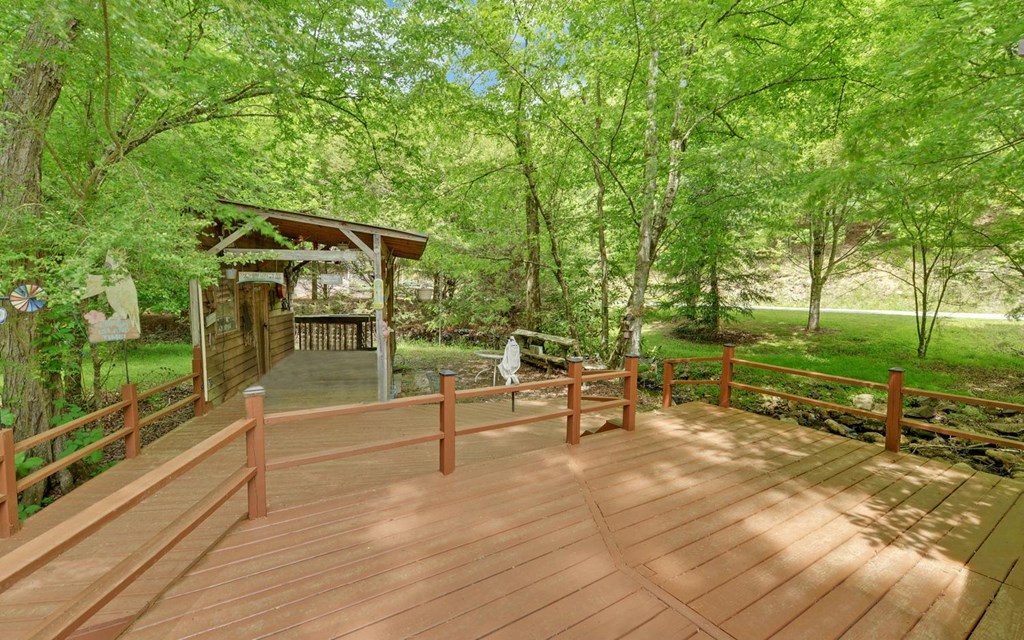 1720 Caney Creek Road Murphy, NC 28906 - Photo 67 of 69 a view of a terrace with chairs and garden