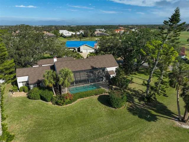 a view of a golf course with a lake
