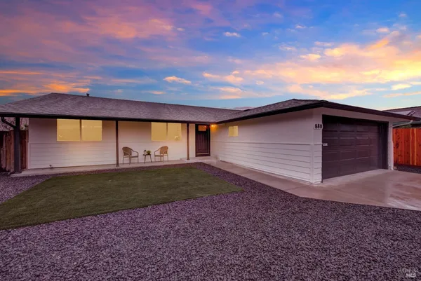 a view of backyard with outdoor space
