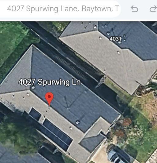 4027 Spurwing Lane Baytown, TX 77521 - Photo 33 of 34 18 Solar Panels on the garage side of the home. Paid For!