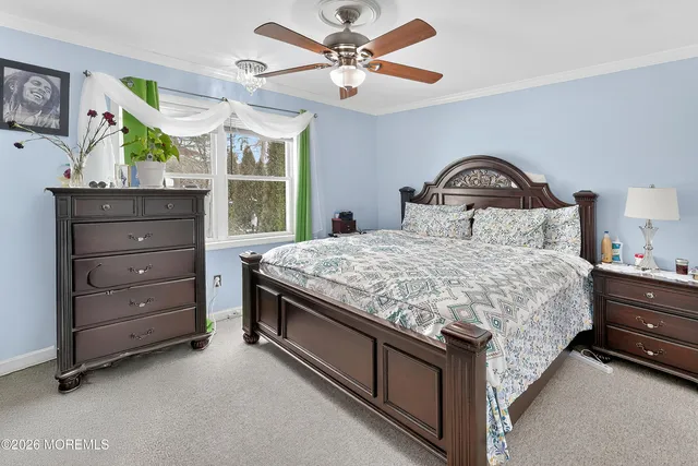 an empty room with ceiling fan