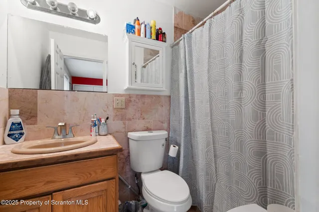 a view of storage and utility room with a washer and dryer