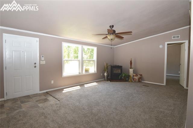 27055 Handle Road Calhan, CO 80808 - Photo 4 of 25 Looking back towards the front door and the entrance to the master bedroom.