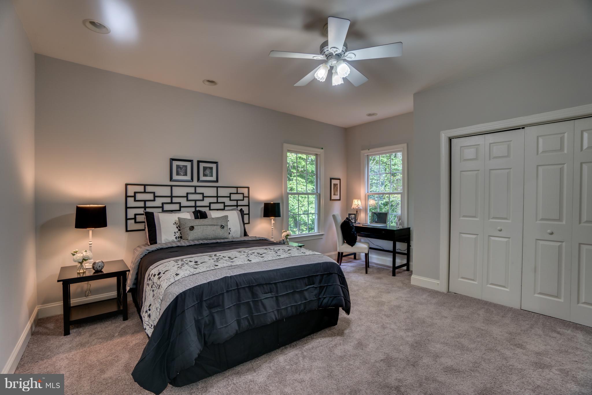 7810 Creekside View Lane Springfield, VA 22153 - Photo 13 of 30 Main level bedroom w/ensuite