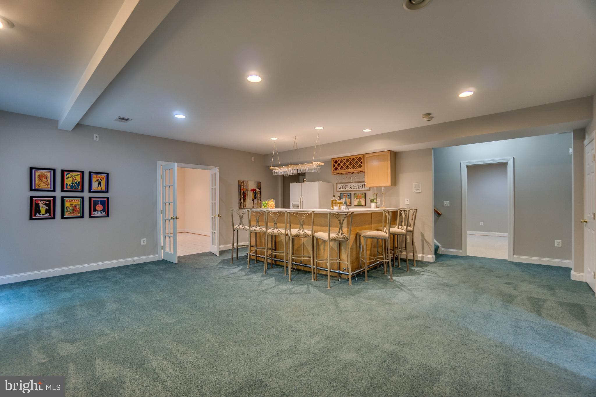 7810 Creekside View Lane Springfield, VA 22153 - Photo 23 of 30 Rec room with bar and 2nd fridge