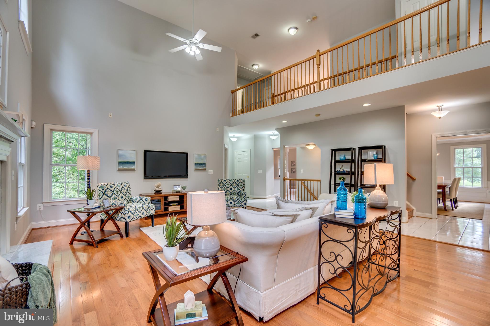 7810 Creekside View Lane Springfield, VA 22153 - Photo 6 of 30 Great room and soaring ceilings...