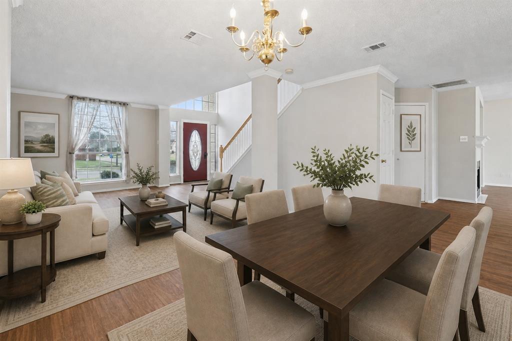 7522 Armstrong Lane Rowlett, TX 75089 - Photo 1 of 36 This photo has been virtually staged (living and dining area)