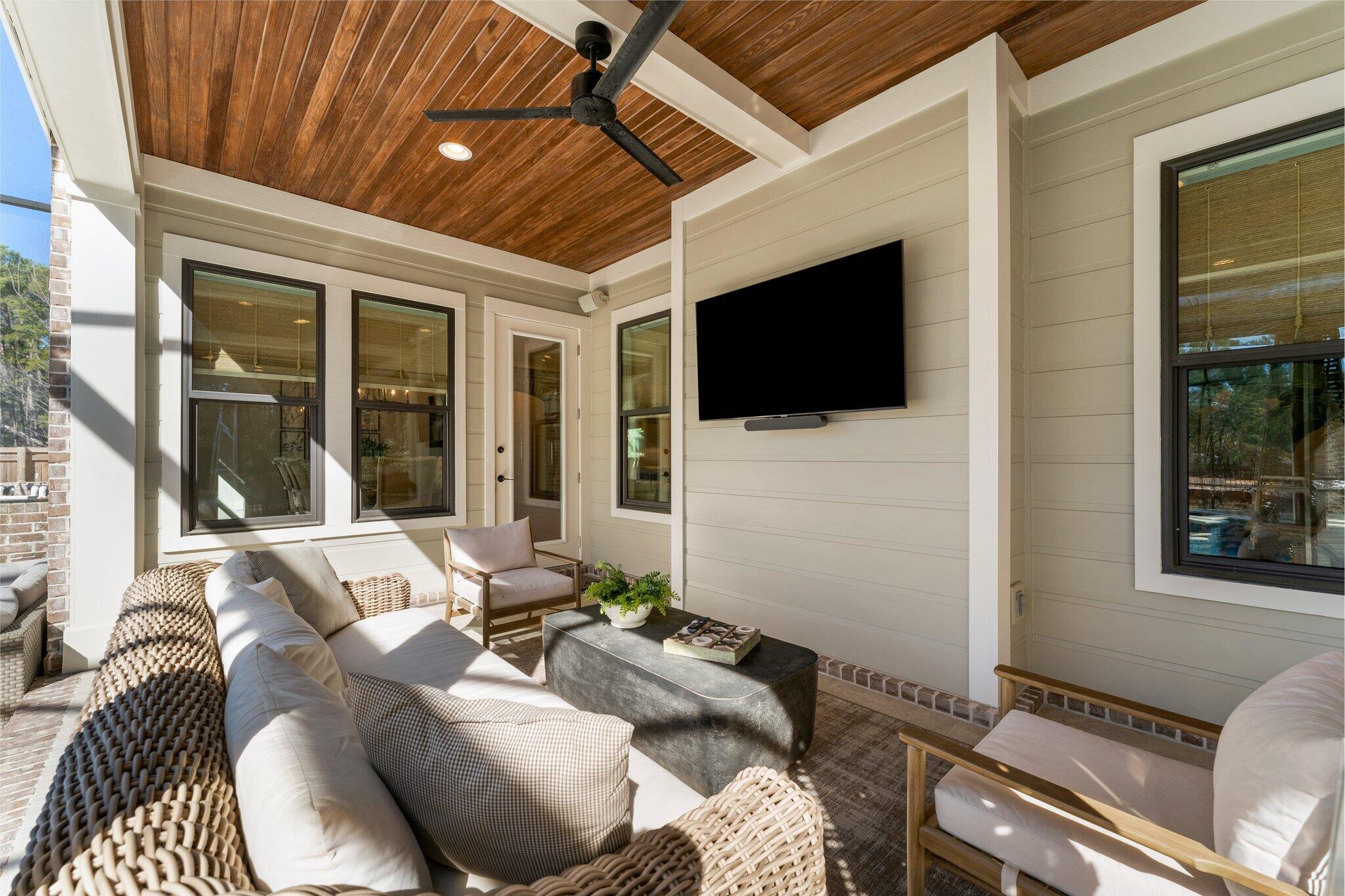 207 Pheasant Way Road Santa Rosa Beach, FL 32459 - Photo 12 of 70 a living room with furniture and a flat screen tv