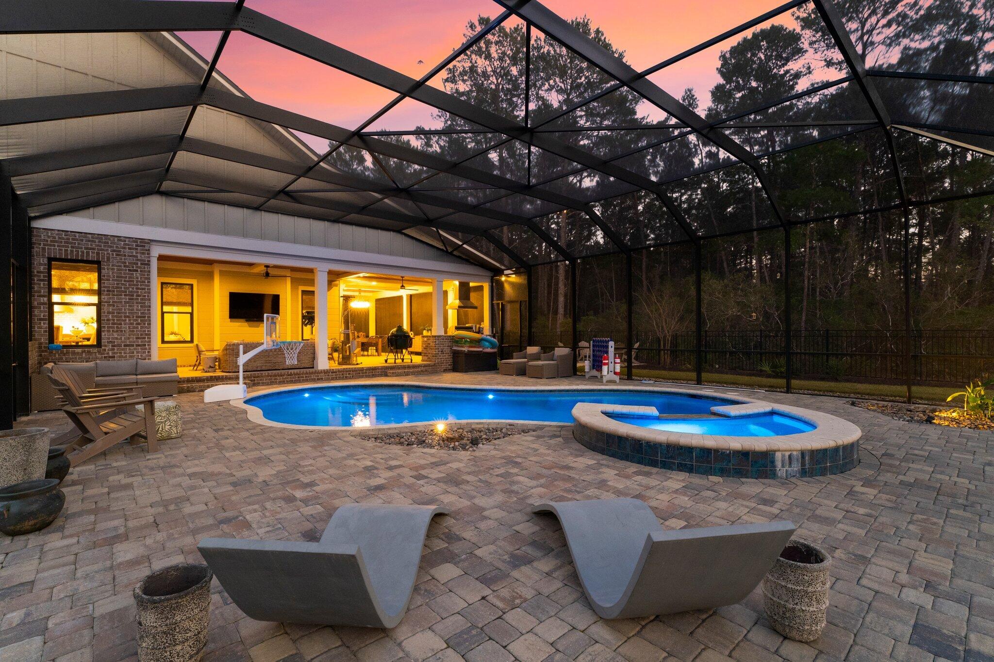 207 Pheasant Way Road Santa Rosa Beach, FL 32459 - Photo 13 of 70 a view of a swimming pool with a patio