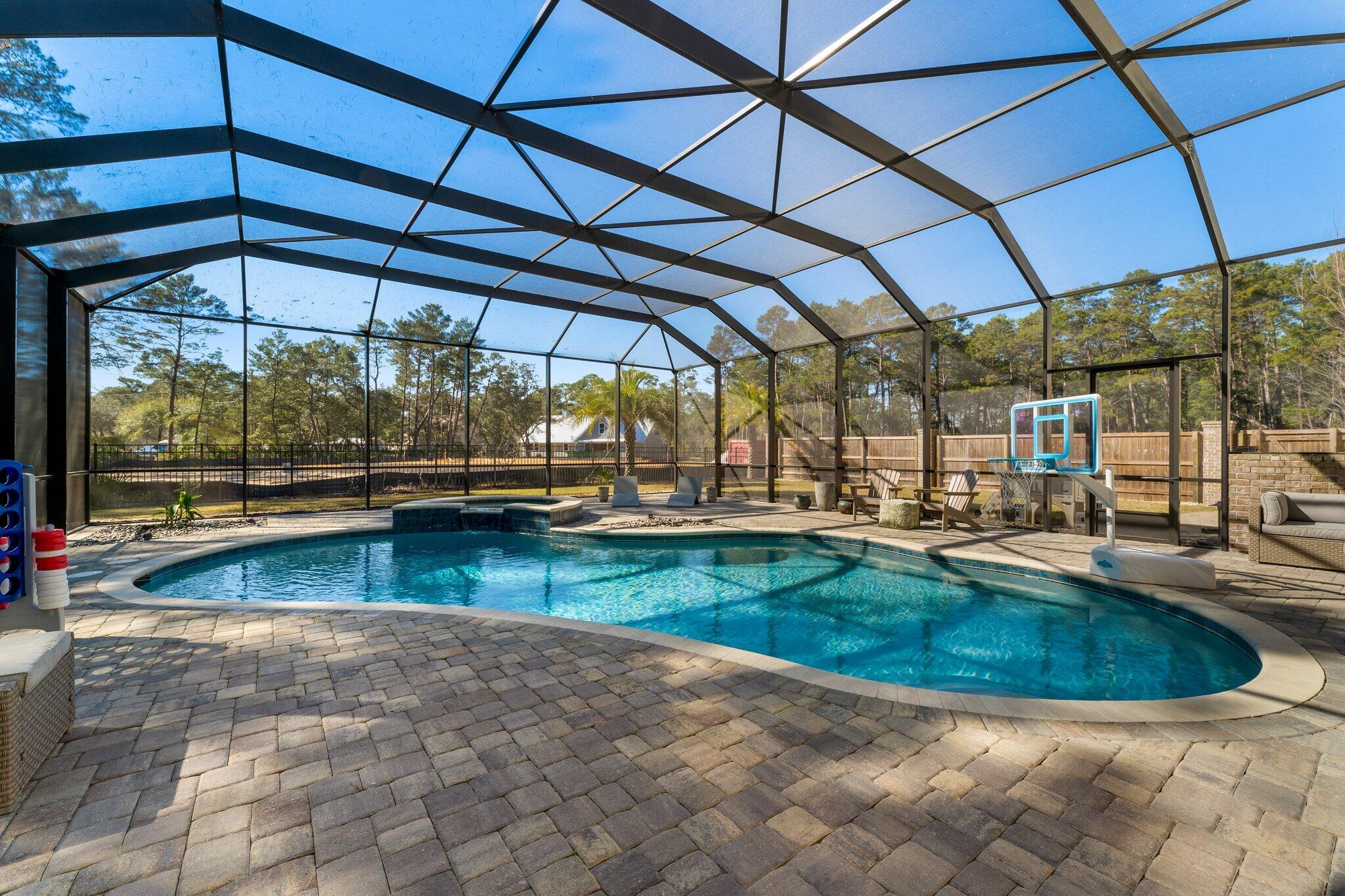 207 Pheasant Way Road Santa Rosa Beach, FL 32459 - Photo 15 of 70 an outdoor view of swimming pool with a patio