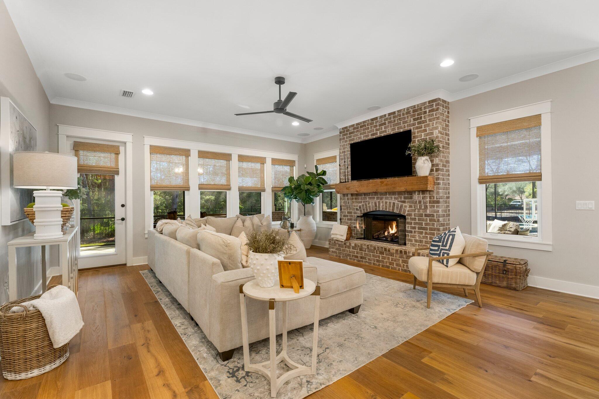 207 Pheasant Way Road Santa Rosa Beach, FL 32459 - Photo 26 of 70 a living room with furniture fireplace and a flat screen tv