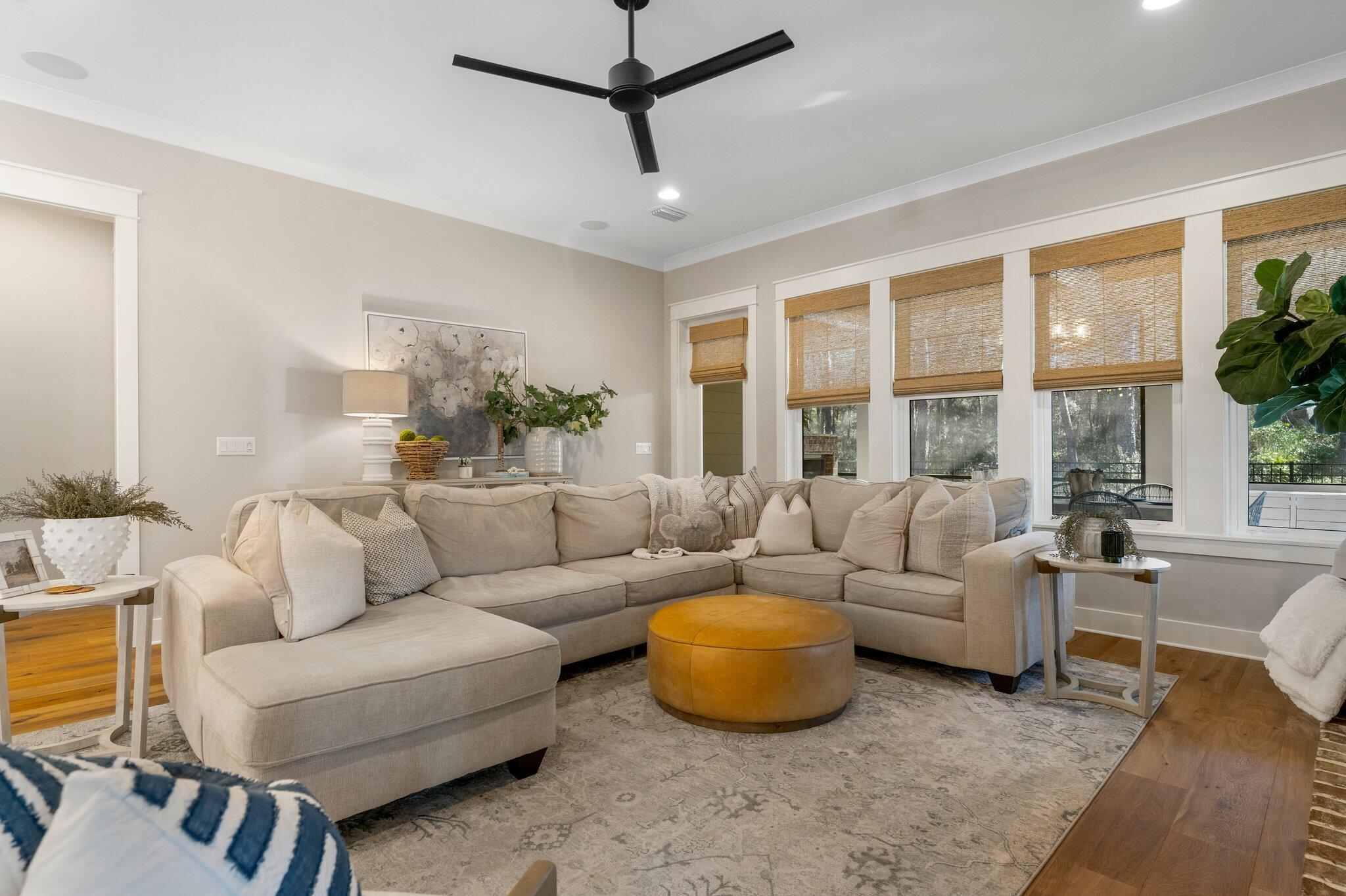 207 Pheasant Way Road Santa Rosa Beach, FL 32459 - Photo 28 of 70 a living room with furniture a large window and a rug