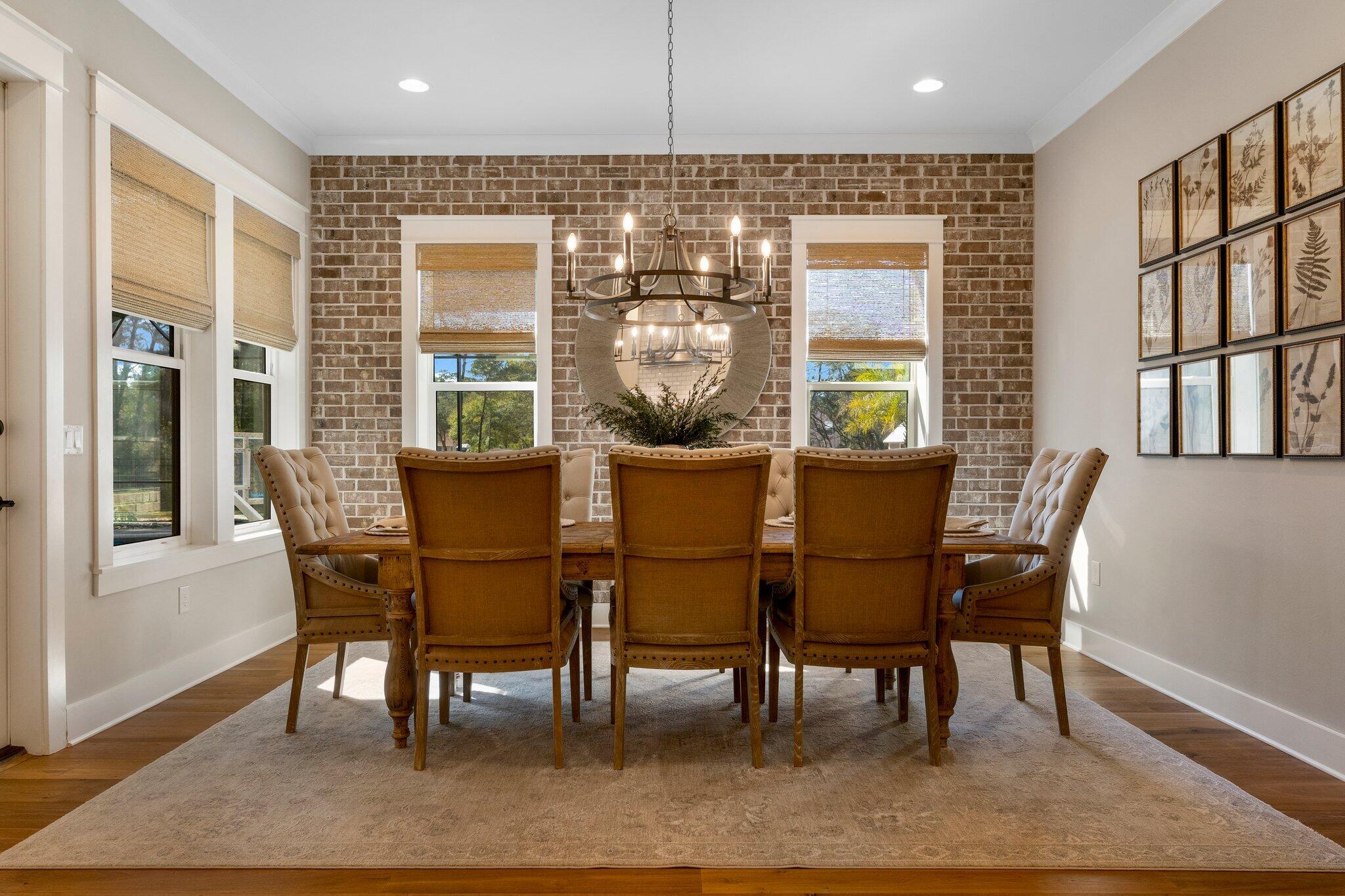 207 Pheasant Way Road Santa Rosa Beach, FL 32459 - Photo 29 of 70 a dining room with furniture window wooden floor