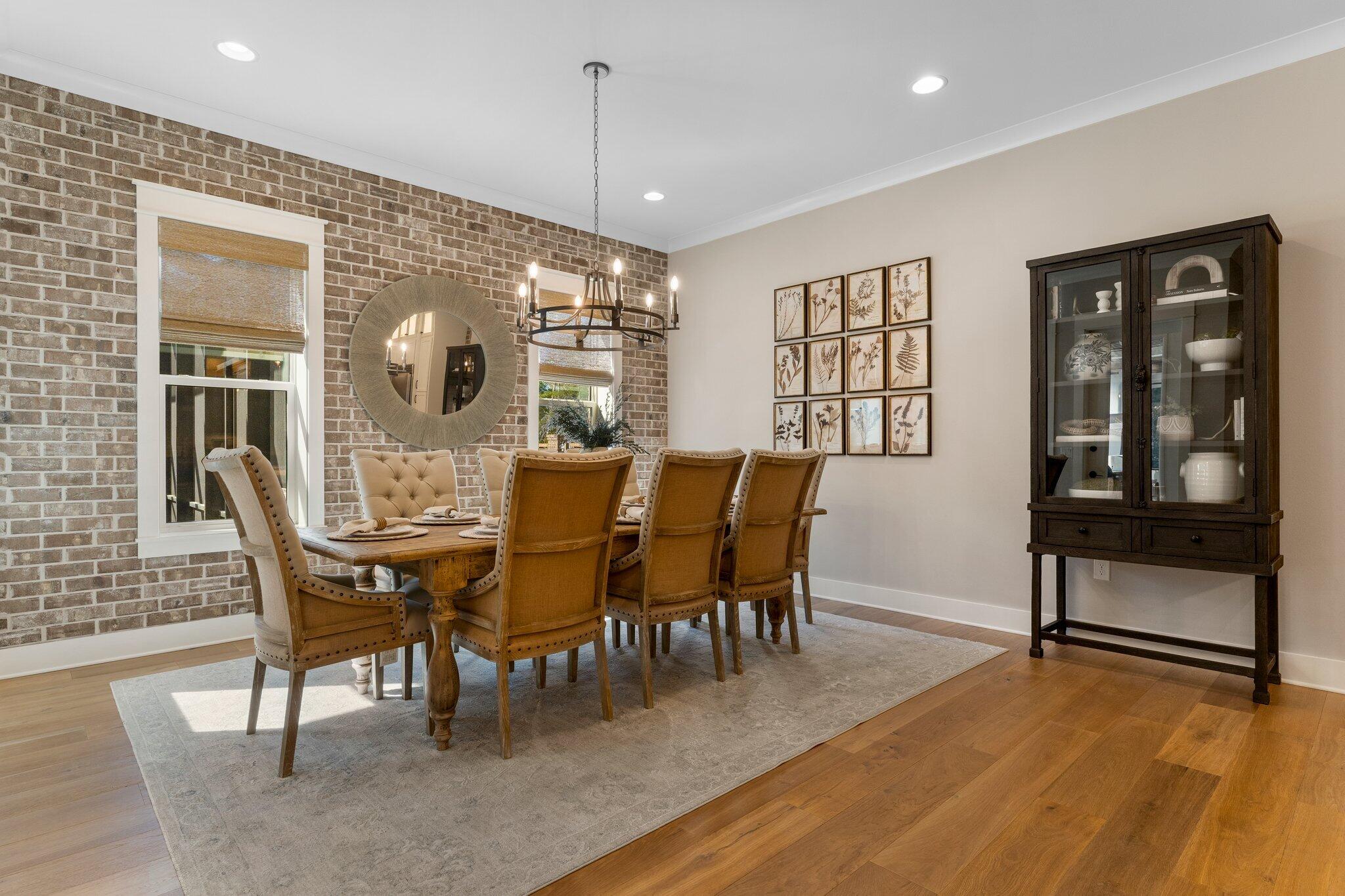 207 Pheasant Way Road Santa Rosa Beach, FL 32459 - Photo 30 of 70 a view of a dining room with furniture window and wooden floor