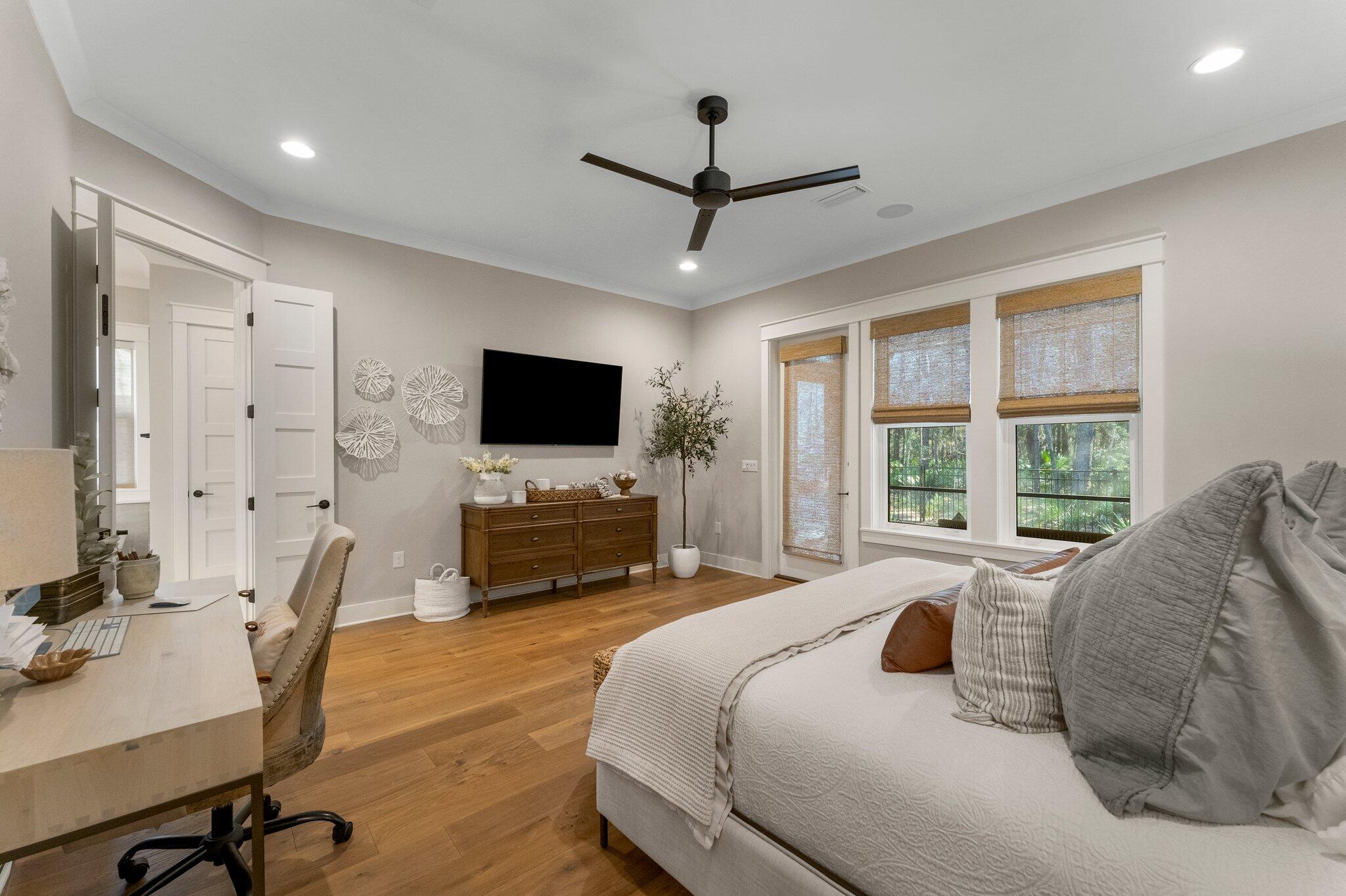 207 Pheasant Way Road Santa Rosa Beach, FL 32459 - Photo 31 of 70 a bedroom with a bed window and a flat screen tv