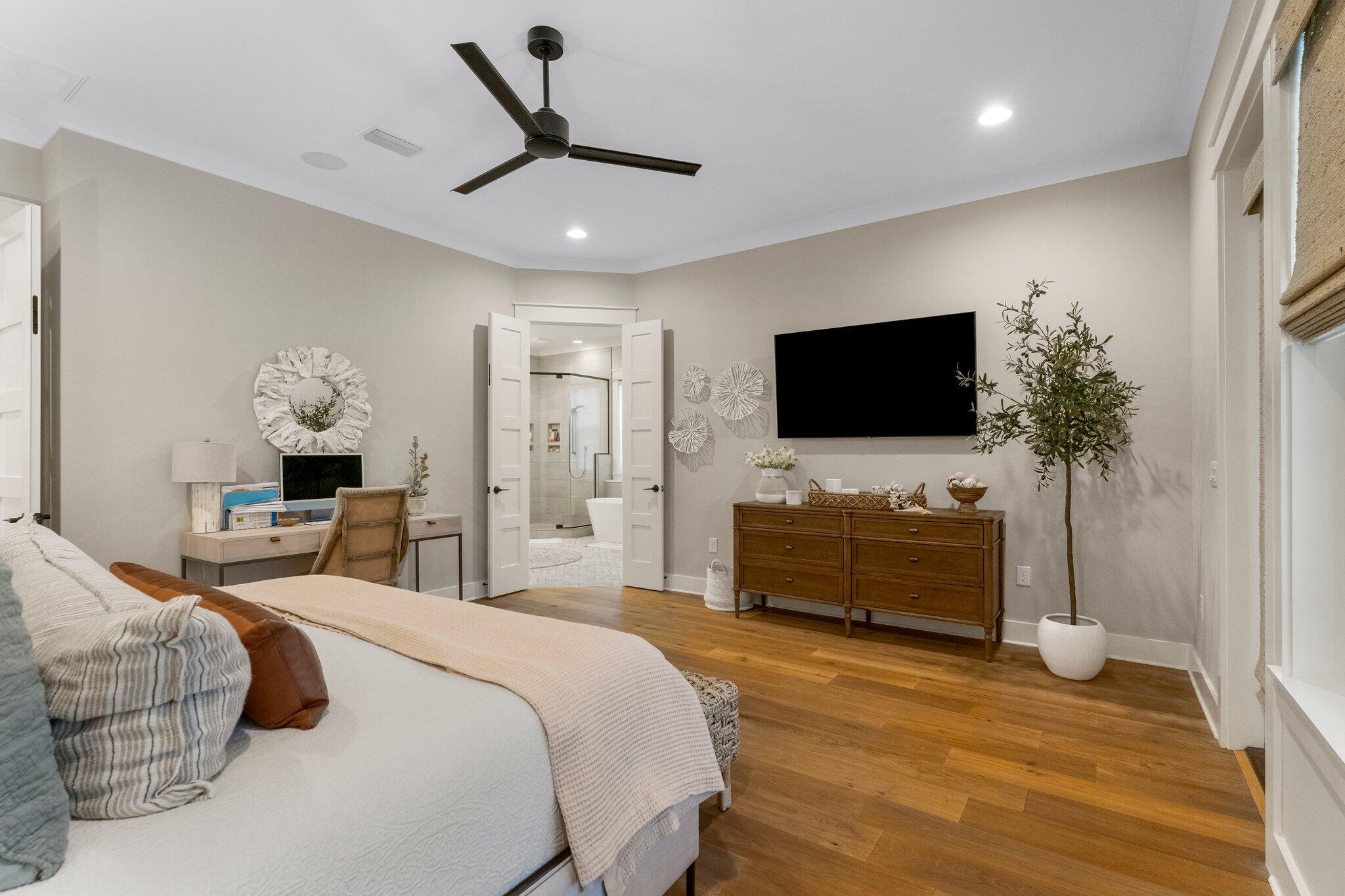 207 Pheasant Way Road Santa Rosa Beach, FL 32459 - Photo 33 of 70 a bedroom with a bed and a flat screen tv