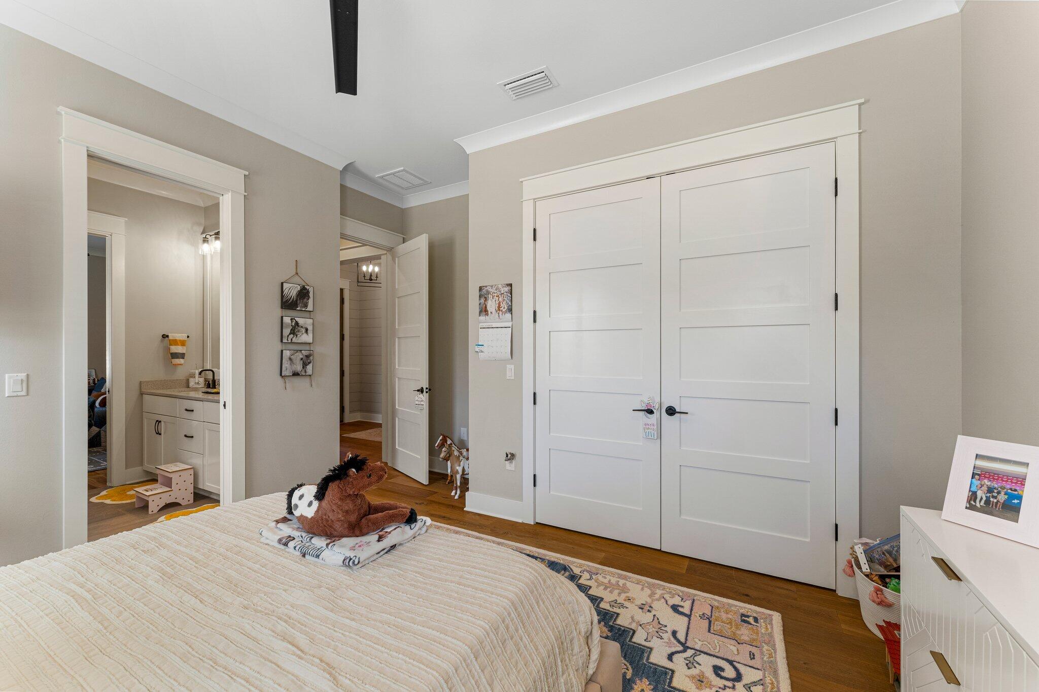 207 Pheasant Way Road Santa Rosa Beach, FL 32459 - Photo 39 of 70 a bedroom with a bed and a dresser