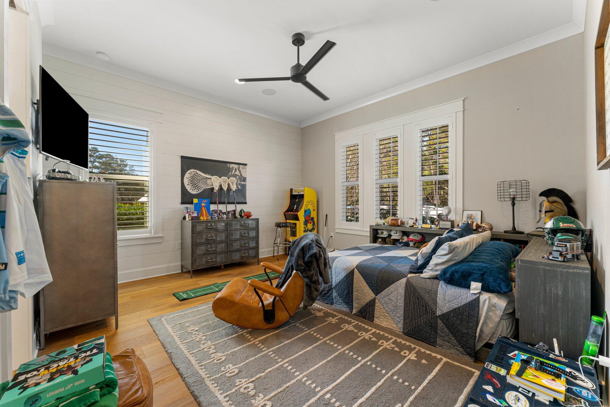 207 Pheasant Way Road Santa Rosa Beach, FL 32459 - Photo 43 of 70 a living room with furniture a window and gym equipment