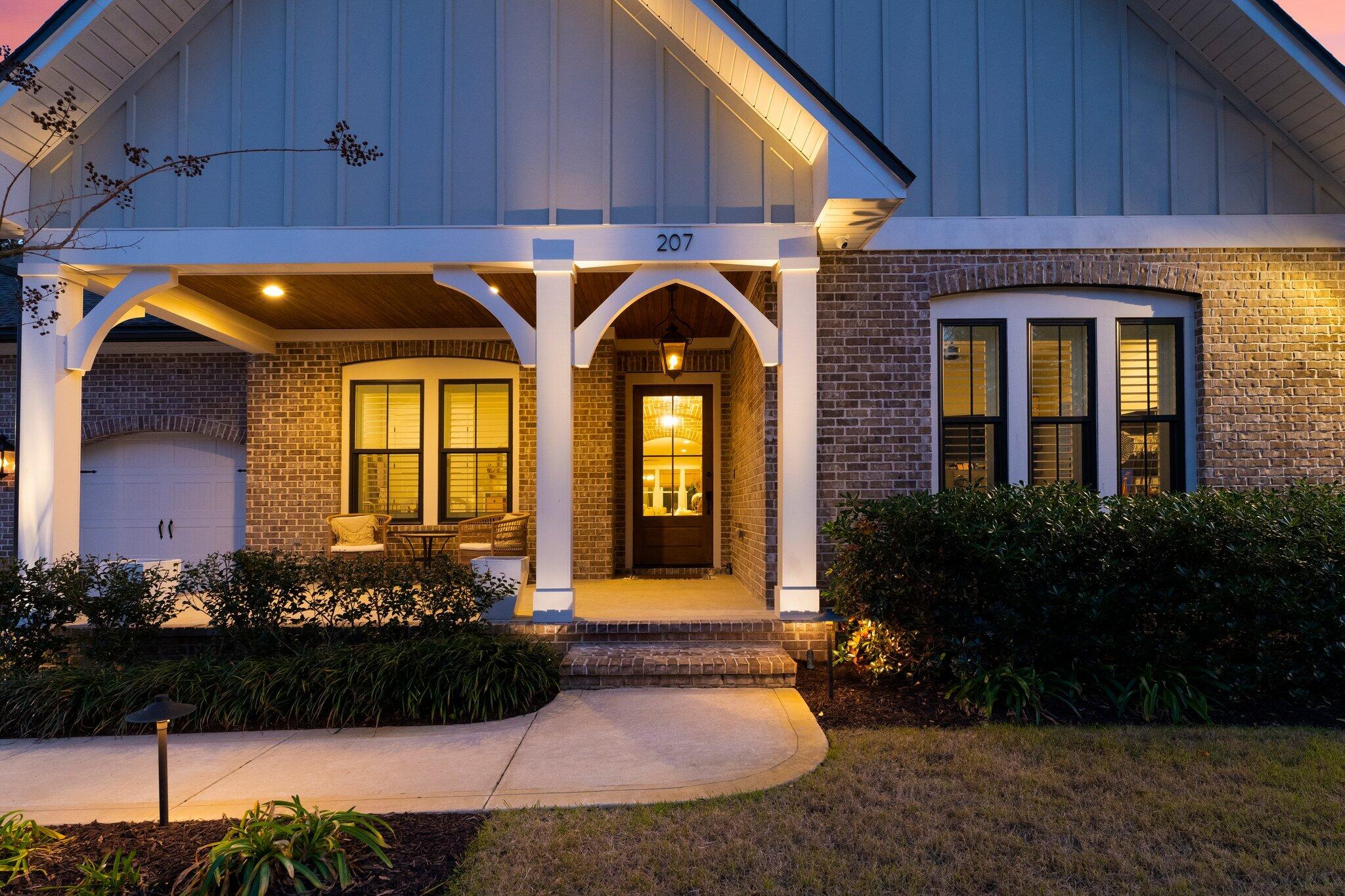 207 Pheasant Way Road Santa Rosa Beach, FL 32459 - Photo 54 of 70 a front view of a house with a porch