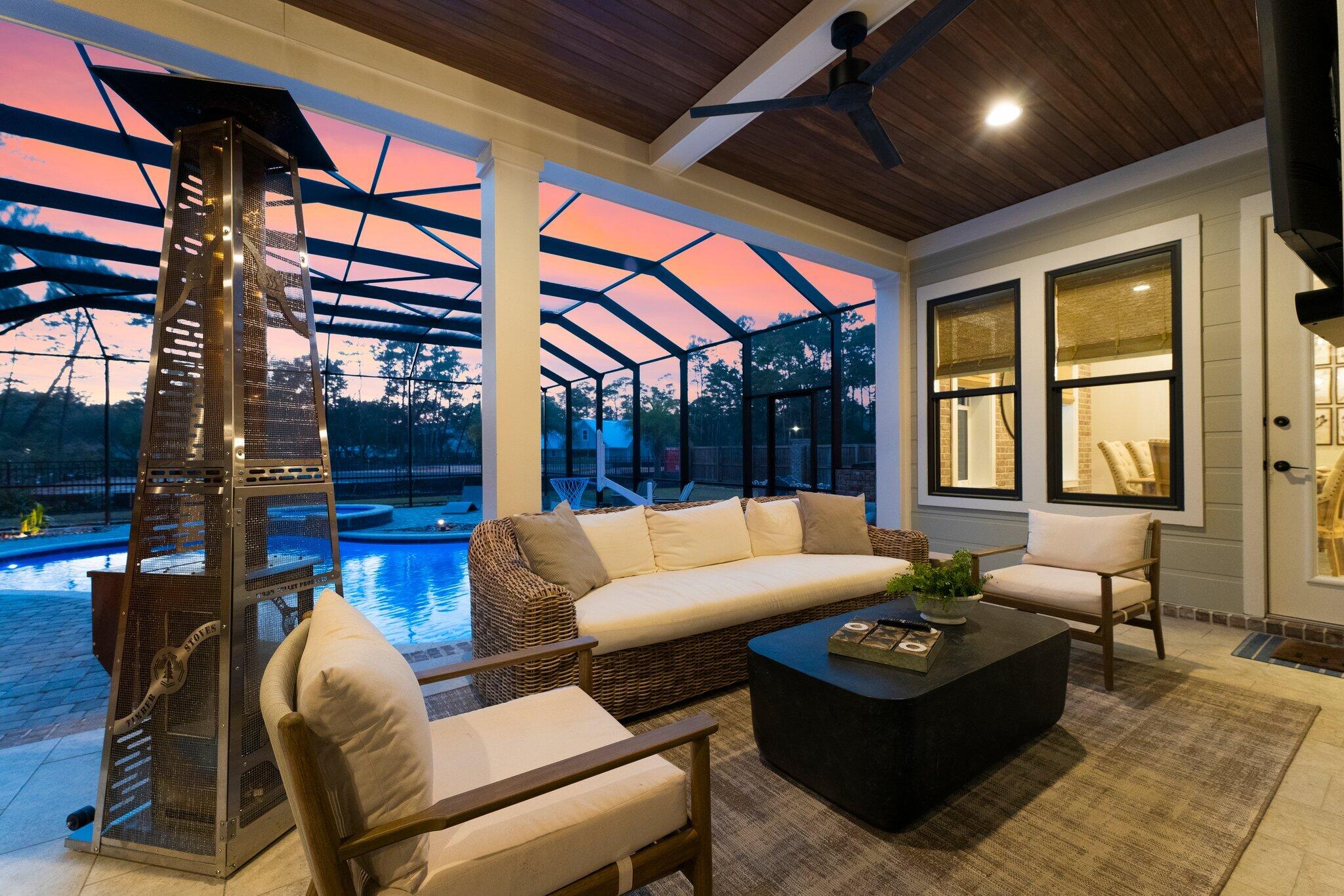 207 Pheasant Way Road Santa Rosa Beach, FL 32459 - Photo 58 of 70 a living room with furniture and a large window