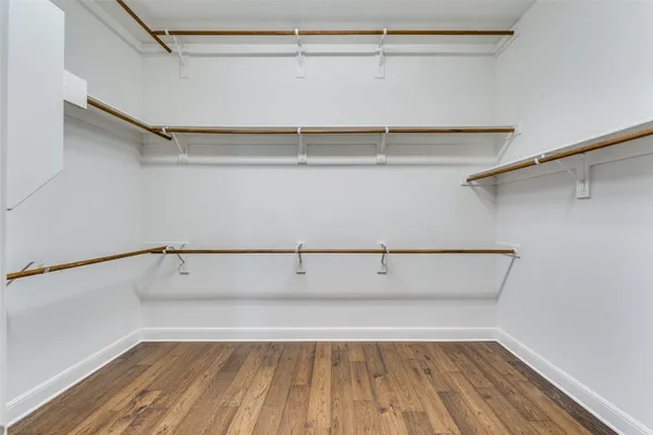 a view of an empty walk in closet