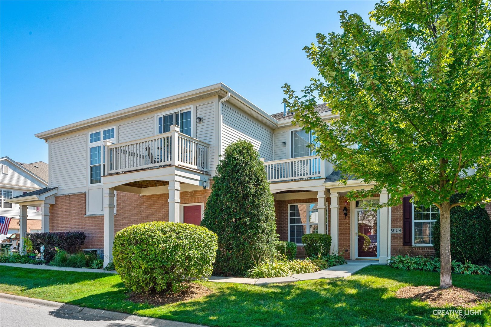 8814 Concord Lane, Unit H Justice, IL 60458 - Photo 1 of 17 front view of a house with a yard
