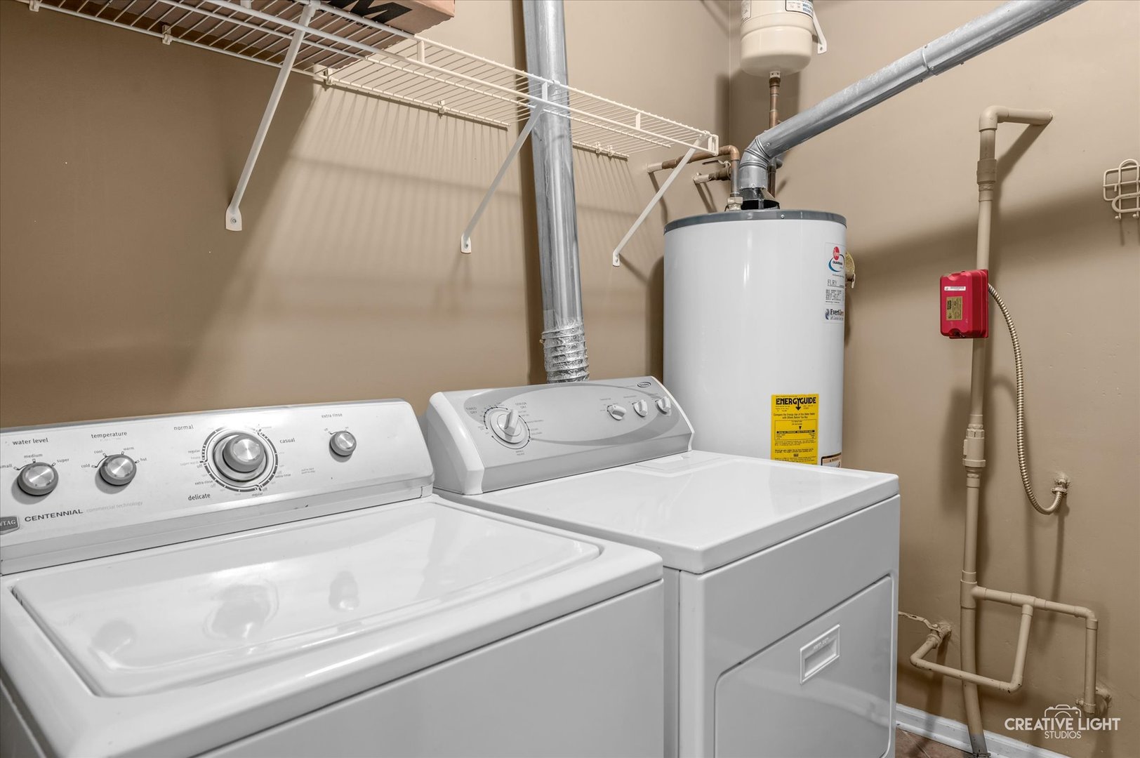 8814 Concord Lane, Unit H Justice, IL 60458 - Photo 15 of 17 a utility room with dryer and washer
