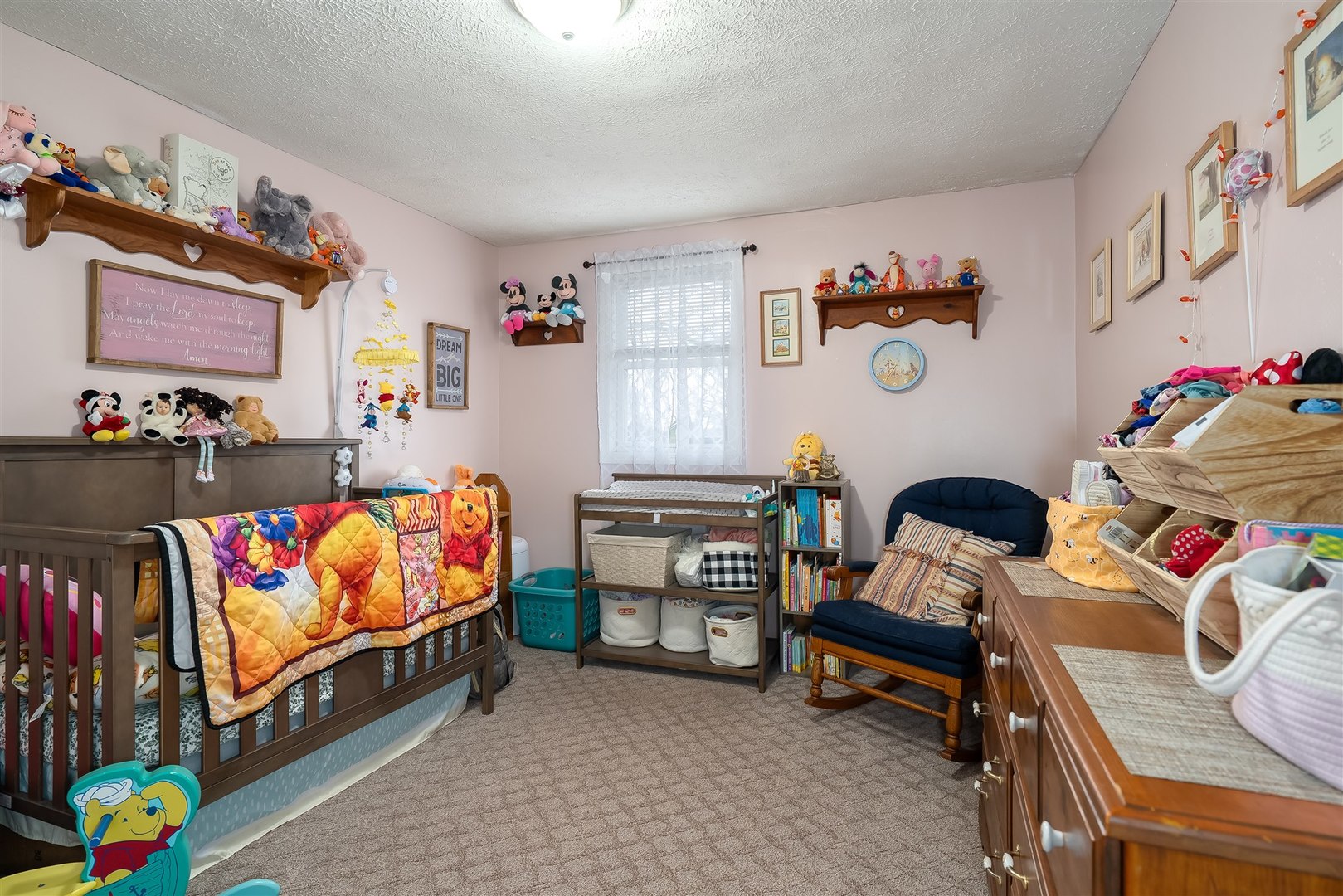 803 Sheridan Street Chenoa, IL 61726 - Photo 12 of 33 a bedroom with toys and a couch
