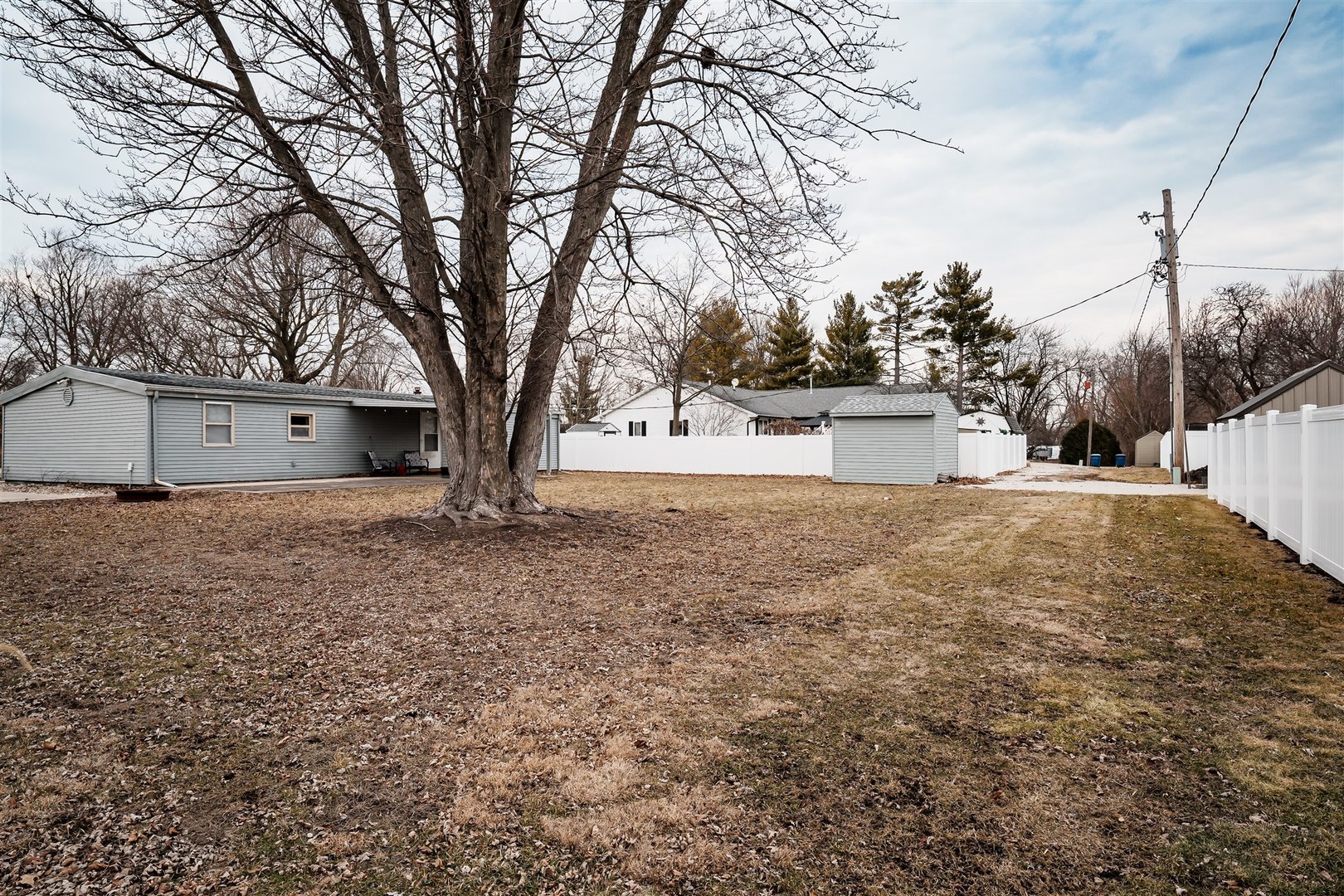 803 Sheridan Street Chenoa, IL 61726 - Photo 26 of 33 a view of white house with a yard