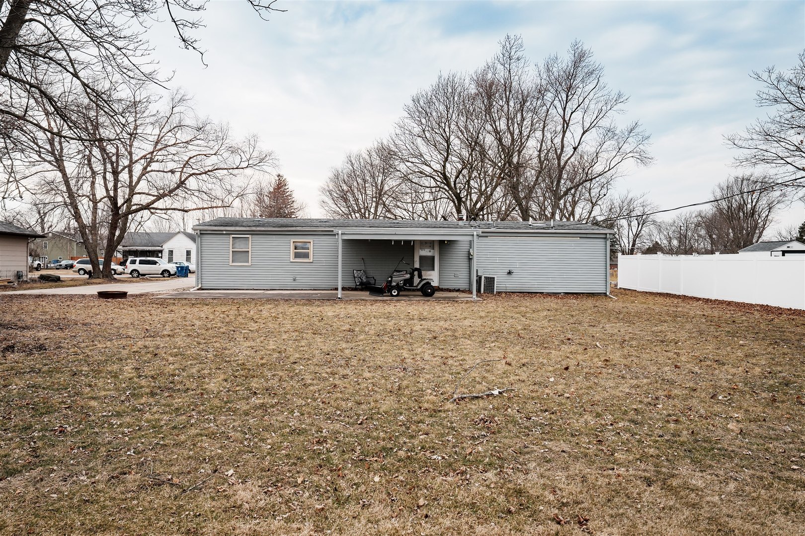803 Sheridan Street Chenoa, IL 61726 - Photo 28 of 33 a front view of house with a yard