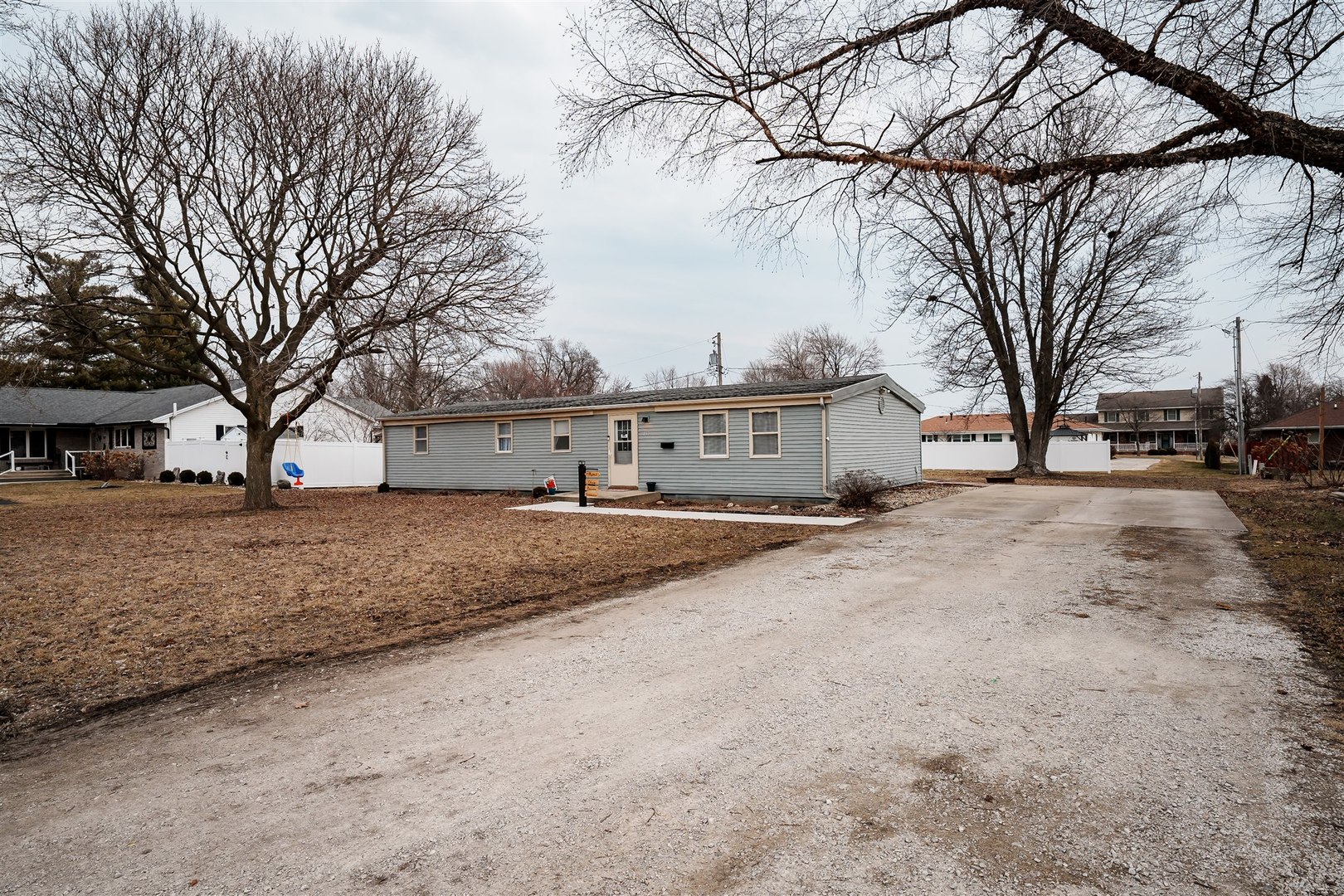 803 Sheridan Street Chenoa, IL 61726 - Photo 32 of 33 a view of road with a white house