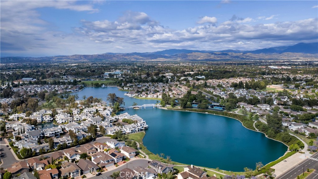 336 Fallingstar Irvine, CA 92614 - Photo 51 of 73 an aerial view of a house with a lake view