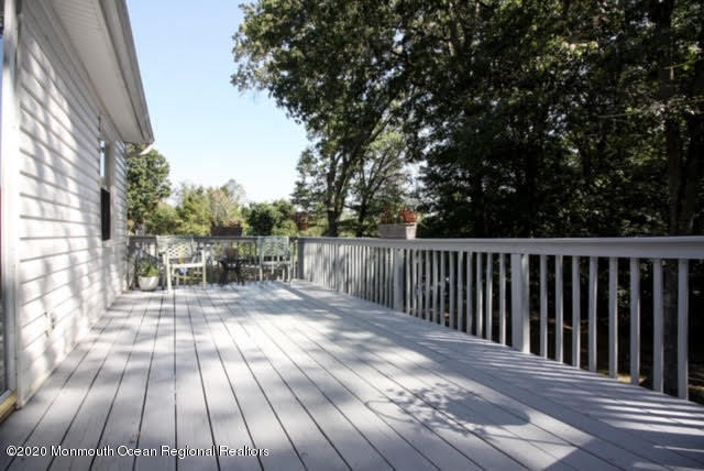 407 Tennent Road Morganville, NJ 07751 - Photo 24 of 27 Deck off Kitchen
