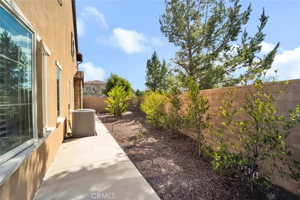 a view of balcony with furniture
