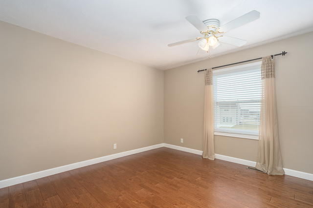 236 South Will Road Diamond, IL 60416 - Photo 8 of 15 a view of an empty room with a window