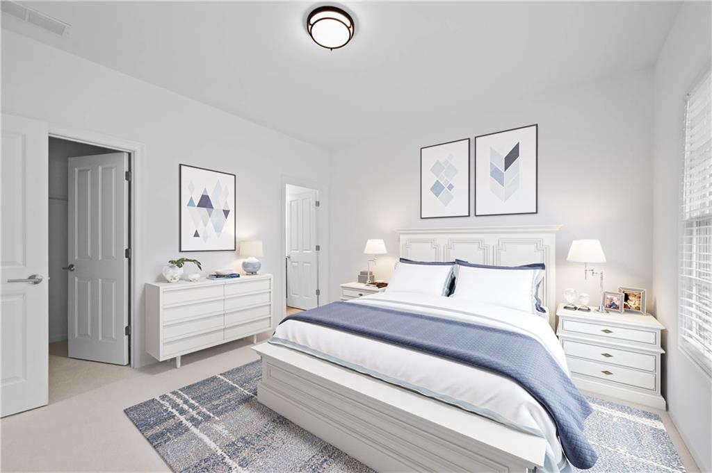 3681 Manor Brook Terrace Atlanta, GA 30319 - Photo 17 of 22 a bedroom with a bed and a cabinets