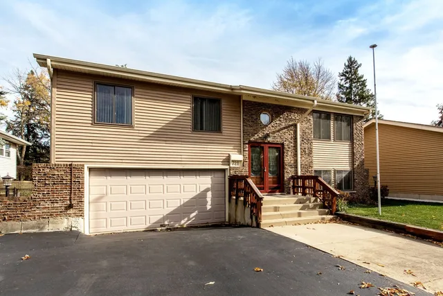 a house view with a backyard space